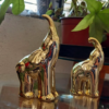 adorno dorado elefante