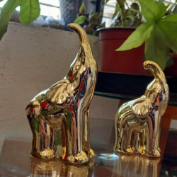 adorno dorado elefante
