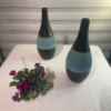 botella de ceramica color verde menta con gris marengo